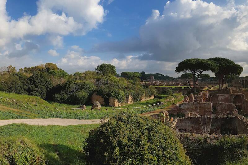 Panoramic photo with fields and ruins